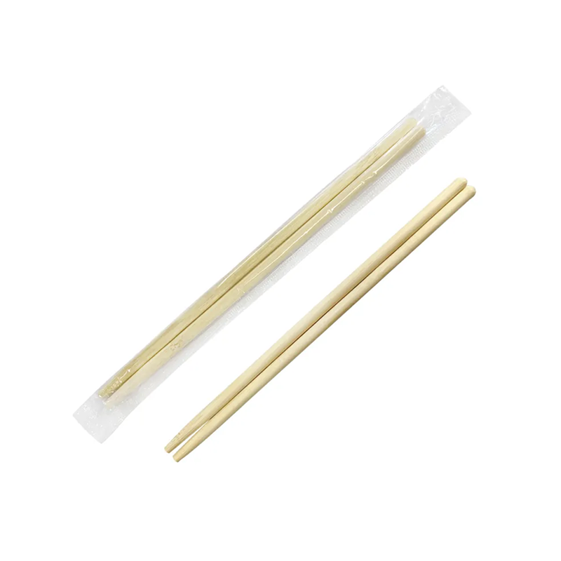 Bamboo chopsticks with plastic wrappers on a white background