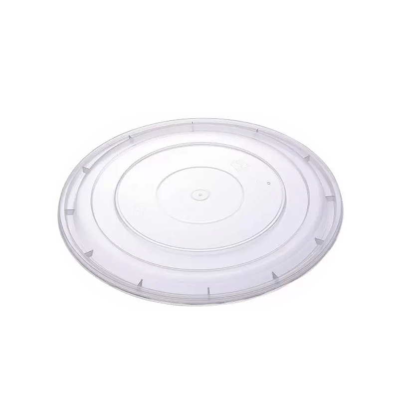 Clear plastic lid for bowls on a white background