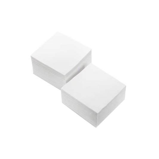 Two stacks of white beverage napkin on a white background