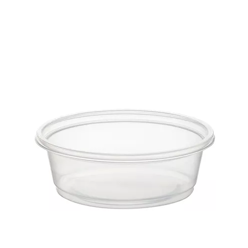 Clear plastic portion cup on a white background