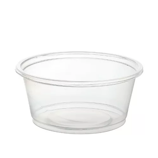 Clear plastic portion cup on a white background